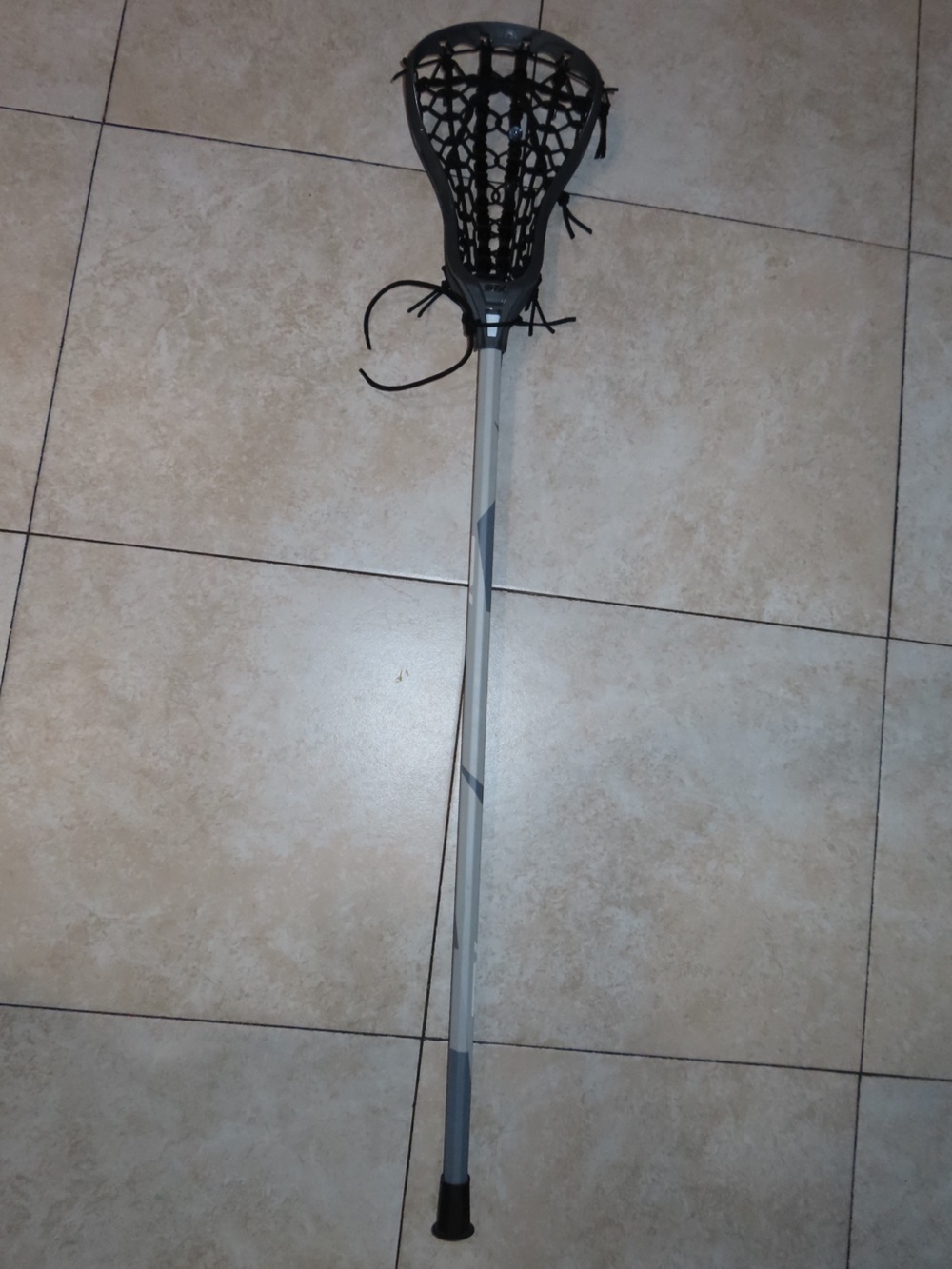 Gray Lacrosse Stick with Black Head and Subtle Dark Accents